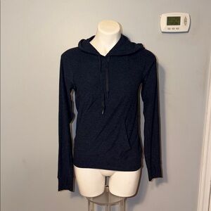 Outdoor Voices ladies, navy blue drawstring hoodie. Medium. Front pocket.